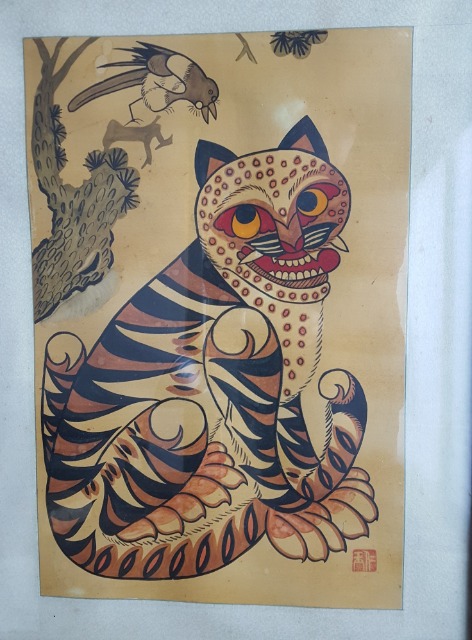 새해 기쁜소식을 전해주는 까치호랑이 그림